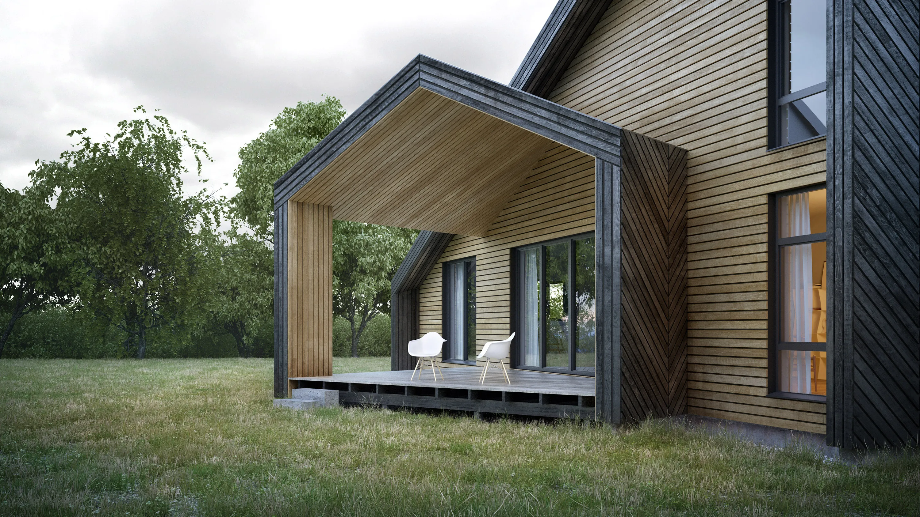 Covered timber porch of DL_house with two chairs, opening onto the garden.