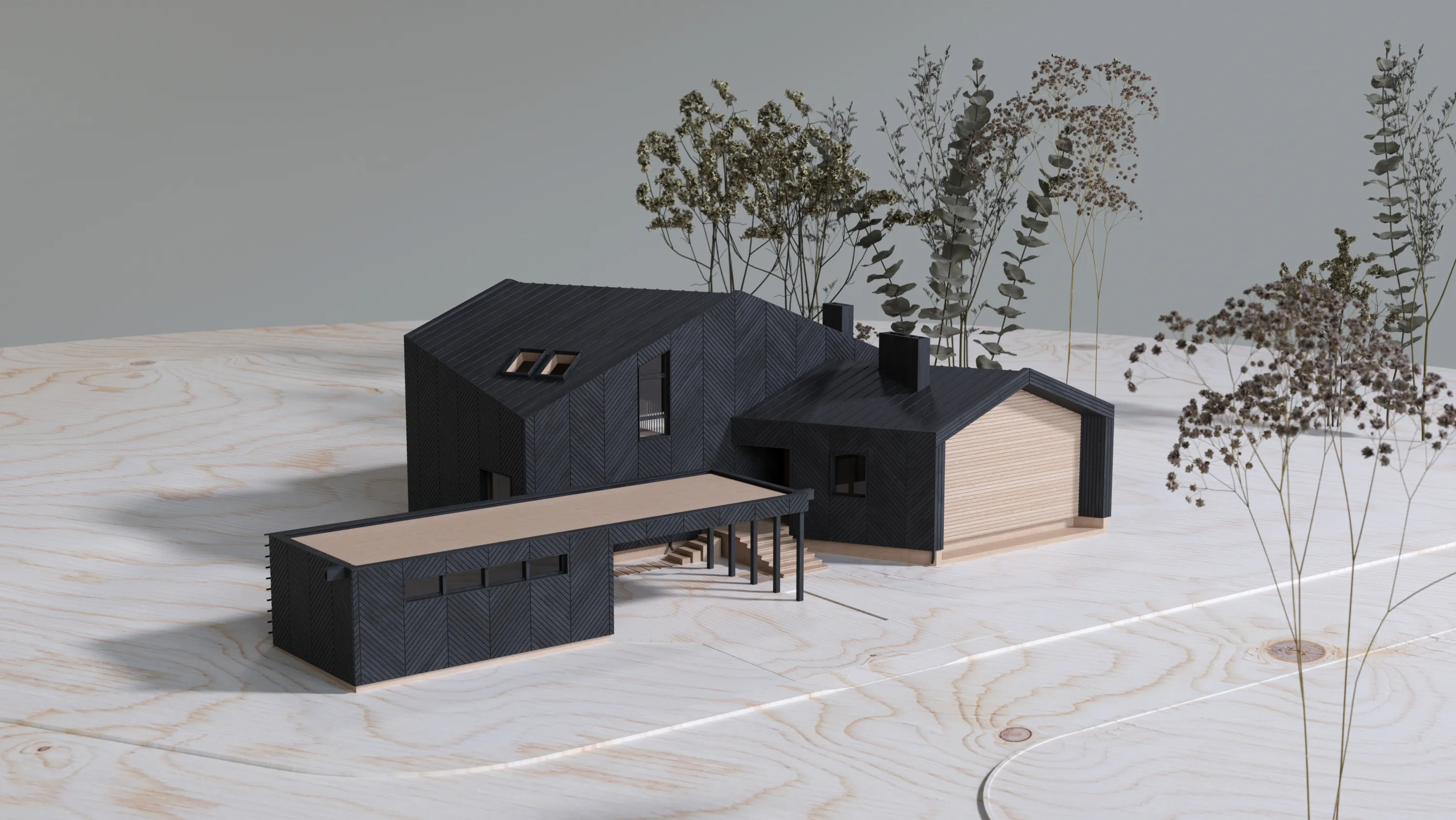Physical model of DL_house in dark chevron timber, set on a pale plywood base with dried planting.
