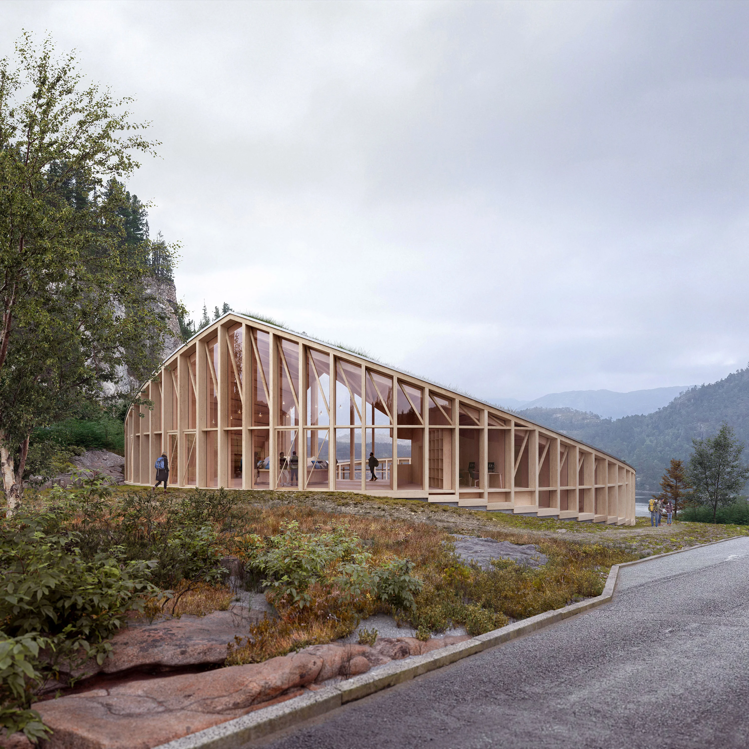 Timber visitor building beside a mountain road in Norway.