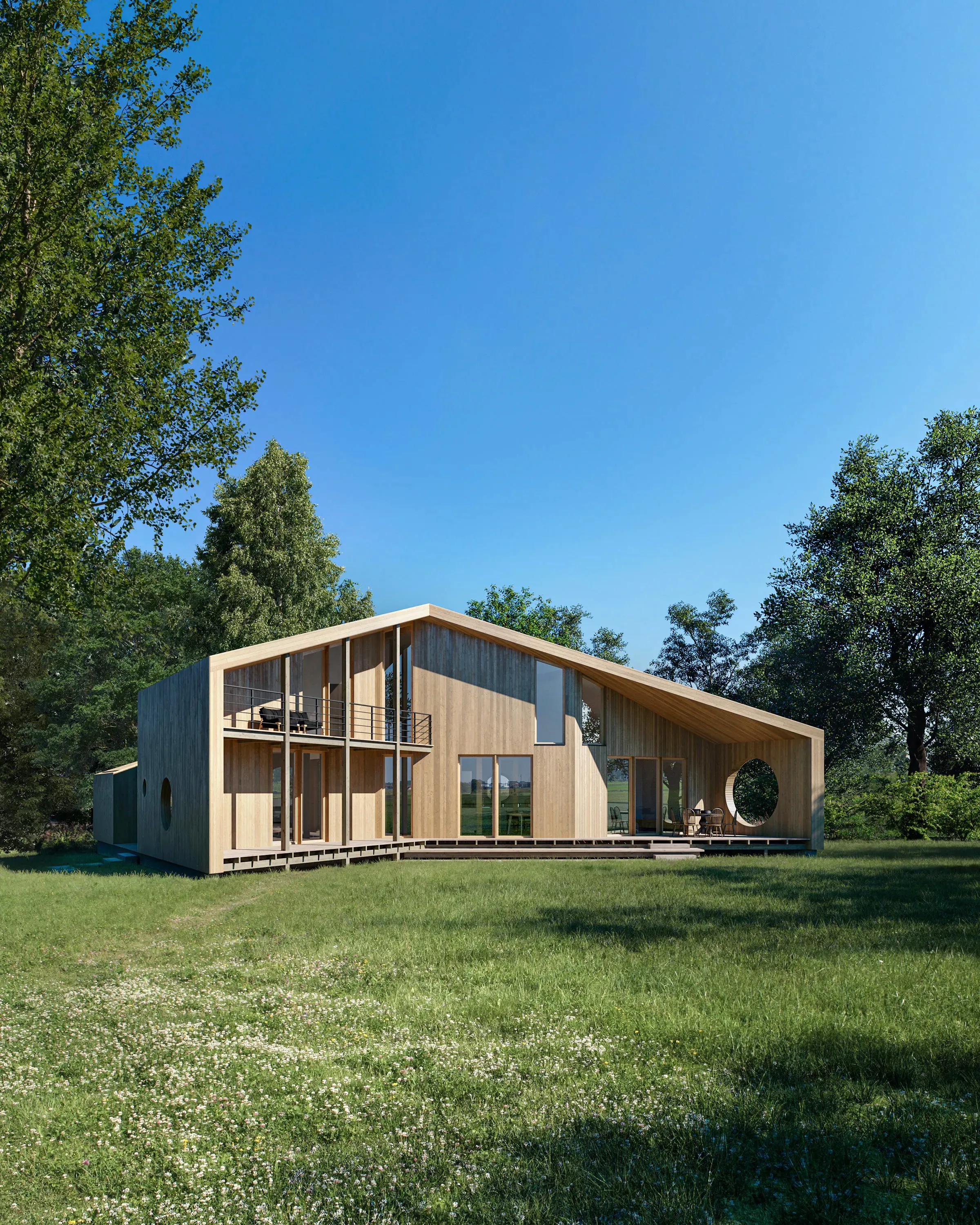 Small timber house with a folded roof in a green meadow.
